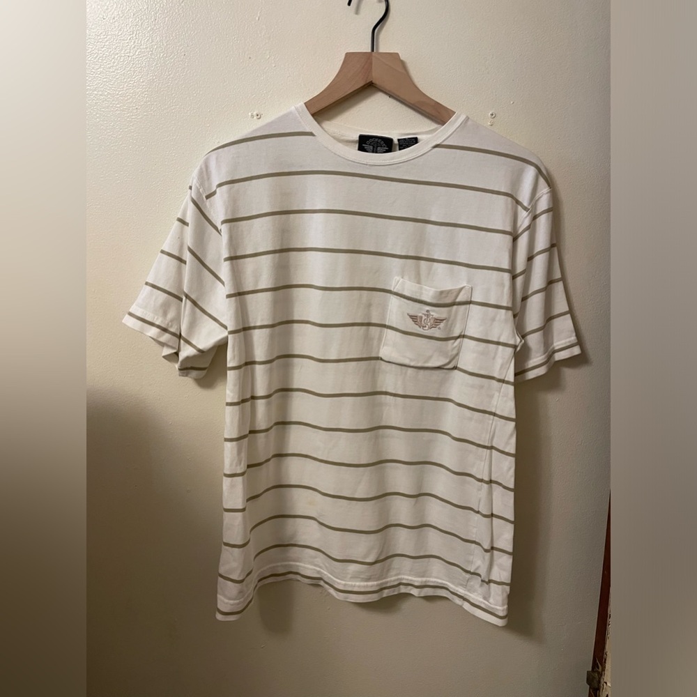 Dockers size small, 100% cotton tan and white striped Woman’s tee